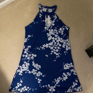 Small, halter dress with keyhole front and back. Blue and white floral. New.